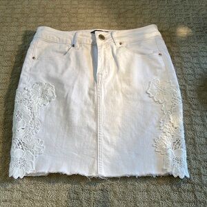 White Denim jean skirt with cotton floral appliqué on sides - Small